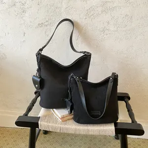 Black matte bucket bag set for women, large capacity shoulder bag with stylish vintage design.