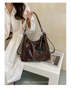 Retro commuter tote bag for women, large capacity shoulder bag, casual minimalist crossbody bag.