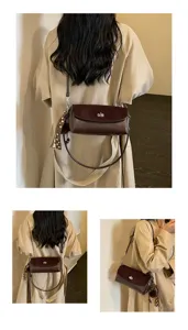 Dark brown leather shoulder bag detail shot showing elegant turn-lock closure and stylish strap.
