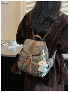 Casual Korean style backpack for women, retro canvas and PU leather daily commute school bookbag.