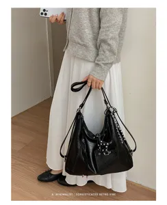 Black vintage commuter tote bag for women, large capacity shoulder bag, chic autumn hobo bag.