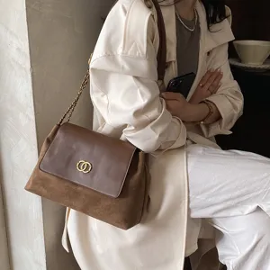 Brown suede shoulder bag with chain strap and ring lock, trendy vintage underarm bag for women
