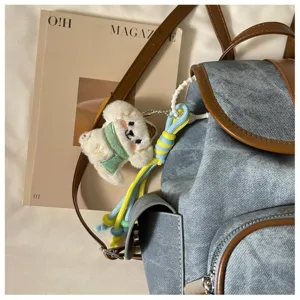 Casual grey denim backpack for women, stylish daily commute large capacity school bag.