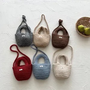 Handmade knitted kids mini crossbody bag in various solid colors, cute and stylish.