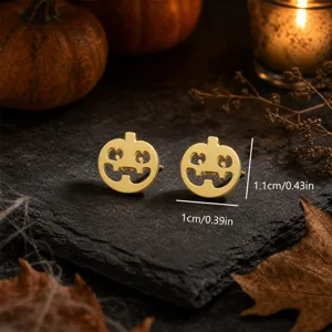 Gold stainless steel pumpkin stud earrings detail view showing compact size and fine Halloween design