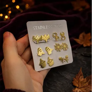 Gold stainless steel Halloween stud earrings set featuring ghost, bat and spider web details.