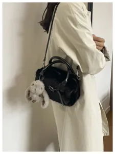 Chic autumn winter fuzzy crossbody pillow bag for women, stylish versatile furry shoulder bag.
