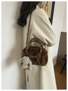 Autumn winter plush handbag for women, fluffy pillow cross body bag with cute bunny charm.