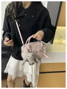 Pink plush crossbody bag for women, cute fluffy pillow bag with bunny pendant for autumn winter.