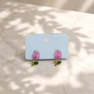 Pink tulip enamel stud earrings on display card, elegant floral design jewelry for women.