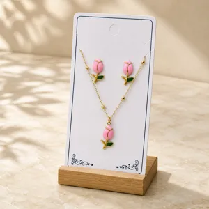 Pink enamel tulip flower necklace and earrings set, elegant gold chain jewelry gift for women.