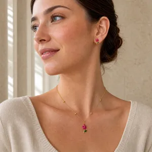 Detailed view of the exquisite enamel tulip pendant necklace and matching stud earrings set.
