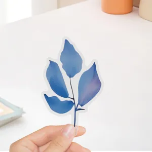 Close-up detail of a beautiful blue ink style transparent PET leaf sticker for DIY decor.
