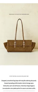 Brown suede leather underarm bag detail, minimalist vintage flap design with metal buckles.