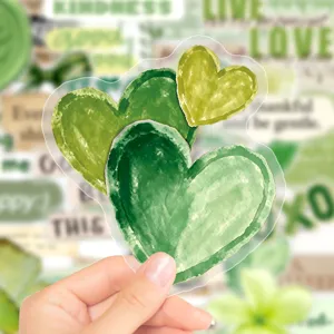 Green watercolor heart transparent decorative sticker detail view for journaling and luggage.