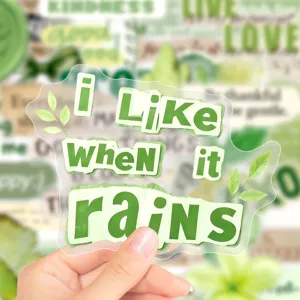 Transparent waterproof green inspirational phrase sticker close-up, perfect for journal decoration.