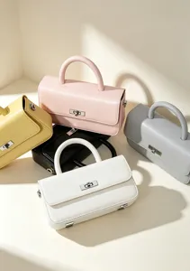 Elegant leather top handle bag, minimalist crossbody purse for women, daily commute style.