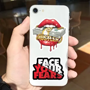 Graffiti sticker detail featuring dollar cash lips and motivational quote design for phone case.