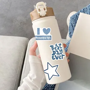 Beige portable vacuum insulated water bottle with stylish blue denim pattern stickers for daily use.