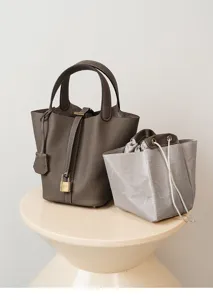 Bolso cubo de cuero genuino para mujer, elegante bolso de mano de gran capacidad con bolsita.