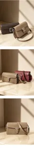 Detailed view of women's minimalist leather shoulder crossbody bag with metal buckle design.