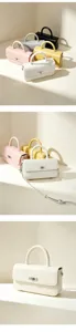 Minimalist genuine leather handbag, versatile shoulder crossbody bag for daily commuting and casual wear.
