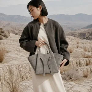 Elegant grey leather tote bag for women, stylish commuter shoulder bag with large capacity.