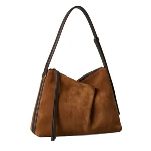 Brown suede shoulder bag for women, stylish niche design crossbody purse with dark brown straps.