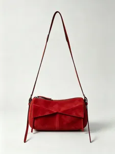 Elegant red suede shoulder bag for women, chic commuting crossbody bag with stylish strap.