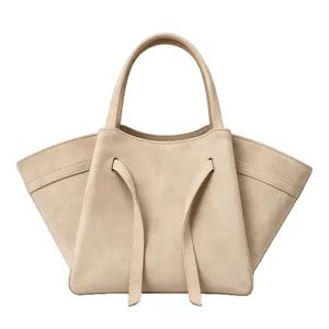 Chic beige suede tote bag for women, large capacity shoulder bag with stylish hanging straps.