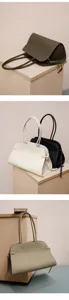 Premium leather tote bag with top handles and chic side cinches, minimalist style detail.
