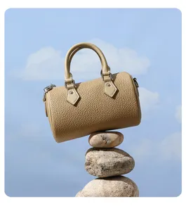 Stylish genuine leather Boston handbag for women, casual commuter shoulder and crossbody bag.