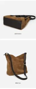 Brown suede hobo shoulder bag with dark leather trim and adjustable buckle strap detail