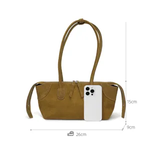 Bruine vintage suède oksel schoudertas voor dames, elegante grote handtas met stijl.