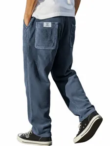 Mens corduroy casual pants loose straight leg vertical stripes trousers detail view