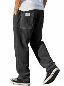 Men's corduroy casual straight leg trousers with back pocket white label, loose fit.