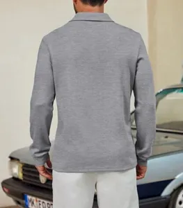 Detailed view of mens long sleeve knit polo shirt with lapel collar for casual daily wear.