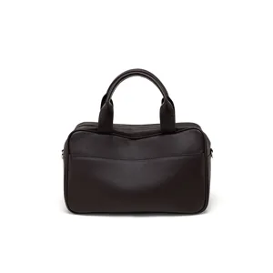 Dark brown leather bowling bag for women, classic top handle Boston handbag daily commuting.