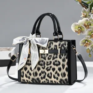 Sac cabas grande capacité imprimé léopard avec nœud poignée supérieure mode femme chic.
