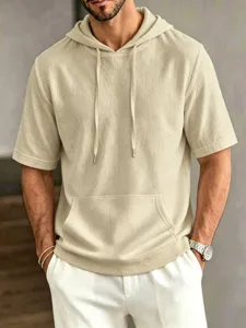 Detailed shot of mens casual short sleeve hooded t-shirt with front pocket and drawstring.