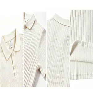 Detailed view of men's knitted polo shirt, featuring classic collar and textured fabric.