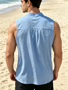 Detail view of men casual linen sleeveless button shirt in light blue color, beach scene.