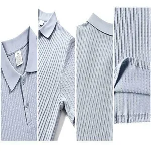 Detailed view of men light blue knit short sleeve polo shirt collar and fabric texture
