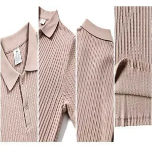 Men knit polo shirt fabric detail showing classic lapel, buttons and fine vertical ribbing.