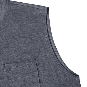Close-up detail of men's dark gray heather sleeveless tank top with chest pocket and clean stitching.