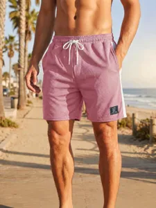 Pantaloncini sportivi da spiaggia traspiranti da uomo in rete con coulisse elastica in vita.