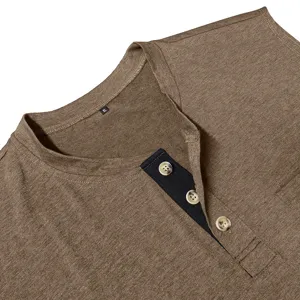 Close-up view of brown men's sleeveless Henley top featuring black button placket and tag.