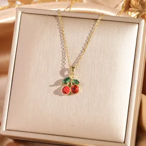 Detailed view of gold zircon cherry pendant necklace, elegant fashion clavicle chain jewelry.