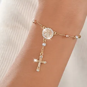 Tri-color metal round bead cross pendant bracelet, copper micro-inlaid cubic zirconia detail.