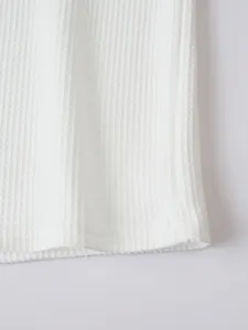 White waffle knit fabric detail, soft texture and clean design for casual long sleeve shirt.